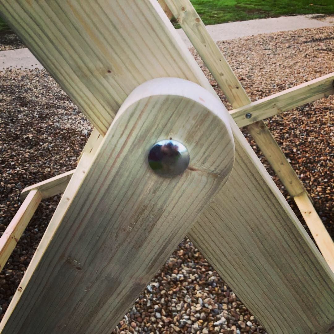 Coach bolt detail on giant deckchair frame